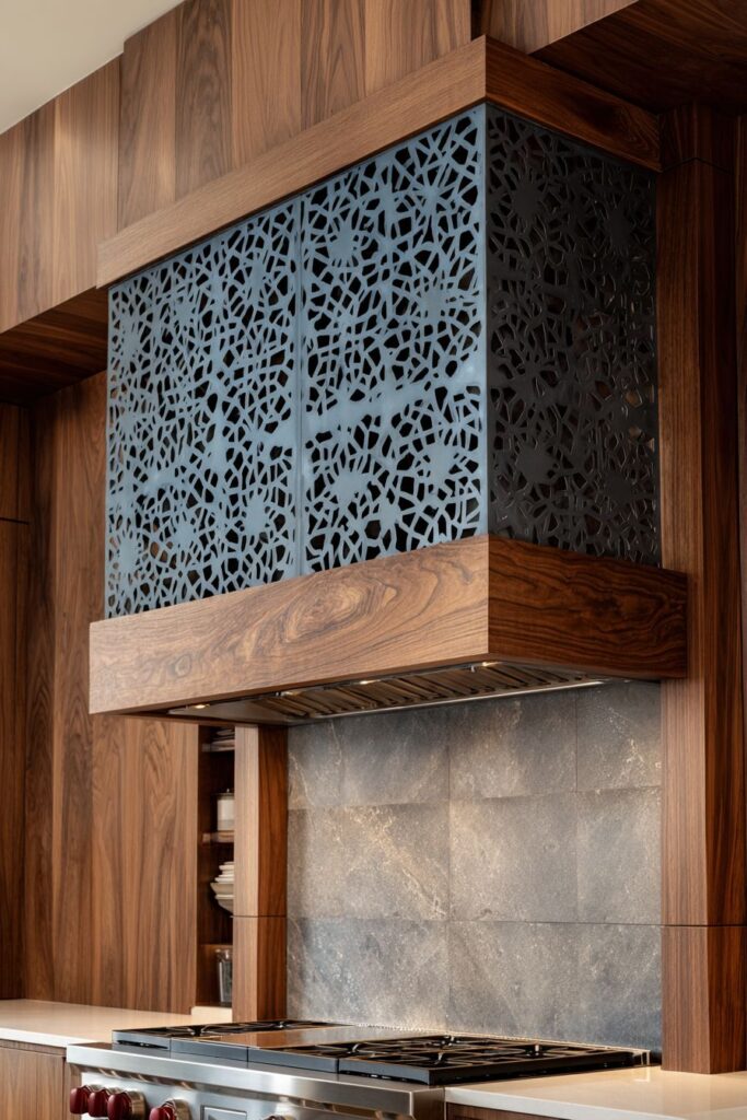 Statement Hood with Geometric Metalwork