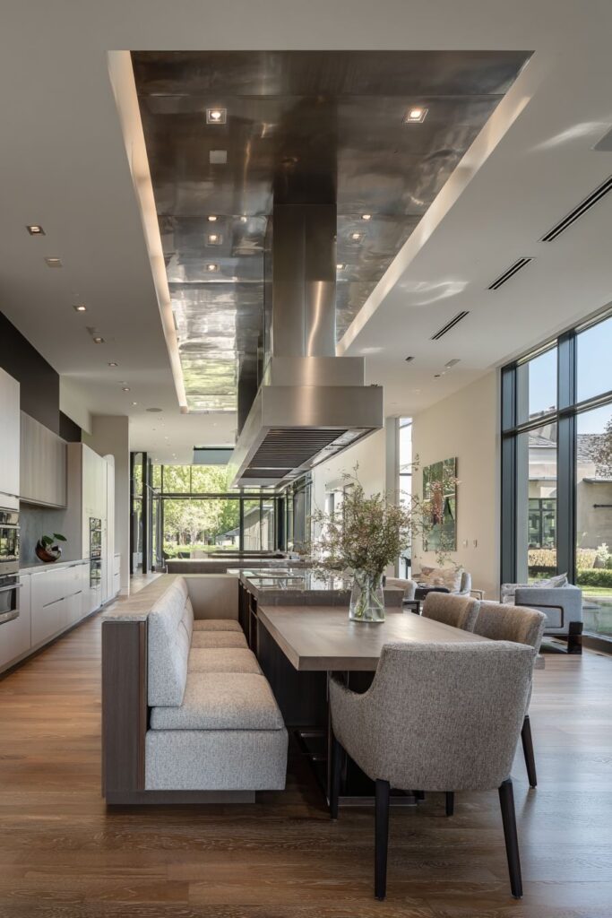 Statement Range Hood with Banquette Seating Integration