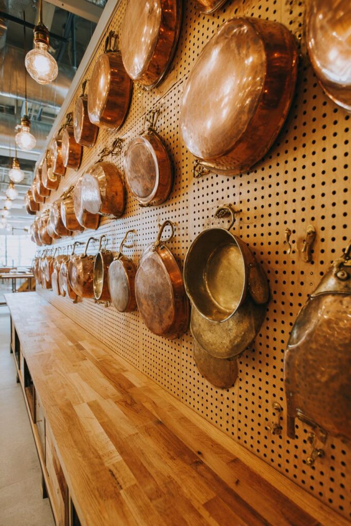 Vintage Copper Cookware Pegboard Display