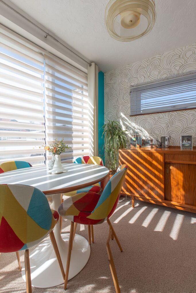 Compact Round Design with Atomic Print Drama